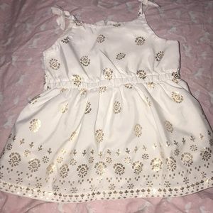 Baby shirt, white with gold design. 3 months